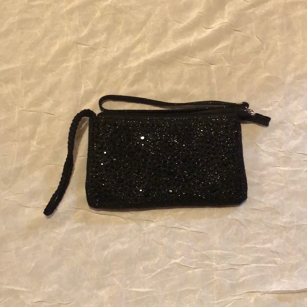 Claire’s. Used. Black
